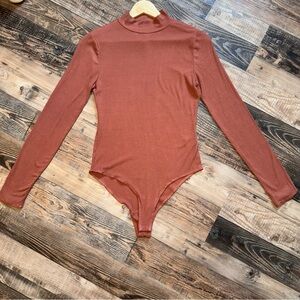 Belle Du Jour Size Large Bodysuit